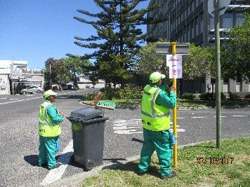 removing illegal posters 2